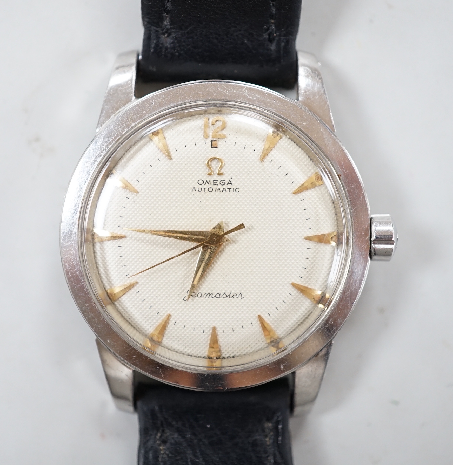 A gentleman's early 1950's stainless steel Omega Seamaster automatic wrist watch, movement c.351, on a leather strap with Omega buckle, no box or papers.